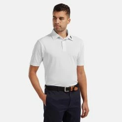 FootJoy Stretch Pique Solid Golf Polo Shirt 9 FootJoy Stretch Pique Solid Golf Polo Shirt -Putter Sales FOOTJOY 91823 FJ PERF SS SHIRT ATH WHITE Model 1