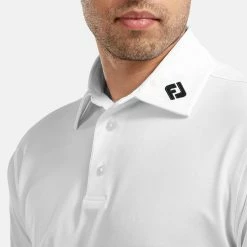 FootJoy Stretch Pique Solid Golf Polo Shirt 10 FootJoy Stretch Pique Solid Golf Polo Shirt -Putter Sales FOOTJOY 91823 FJ PERF SS SHIRT ATH WHITE Model 2