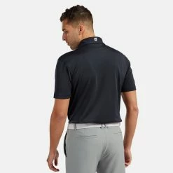 FootJoy Stretch Pique Solid Golf Polo Shirt -Putter Sales FOOTJOY PERF SS SHIRT ATH NAVY Model 3