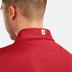 FootJoy Stretch Pique Solid Golf Polo Shirt 10 FootJoy Stretch Pique Solid Golf Polo Shirt -Putter Sales FOOTJOY PERF SS SHIRT ATH RED Model 2