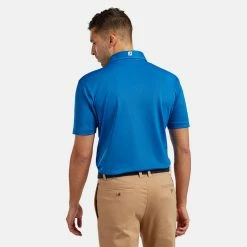 FootJoy Stretch Pique Solid Golf Polo Shirt -Putter Sales footjoy pique ss shirt ath 91817 cobalt Model 3